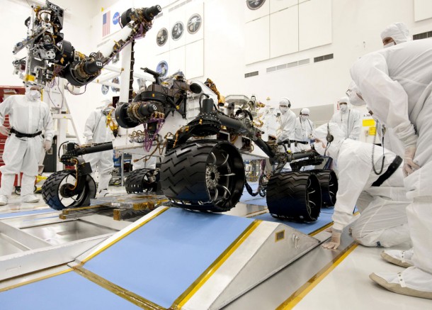 The suspension system on NASA Mars rover Curiosity easily accommodates rolling over a ramp in this Sept. 10, 2010, test drive inside the Spacecraft Assembly Facility at NASA's Jet Propulsion Laboratory, Pasadena, Calif. Credit: NASA/JPL-Caltech The suspension system on NASA Mars rover Curiosity easily accommodates rolling over a ramp in this Sept. 10, 2010, test drive inside the Spacecraft Assembly Facility at NASA's Jet Propulsion Laboratory, Pasadena, Calif. Credit: NASA/JPL-Caltech