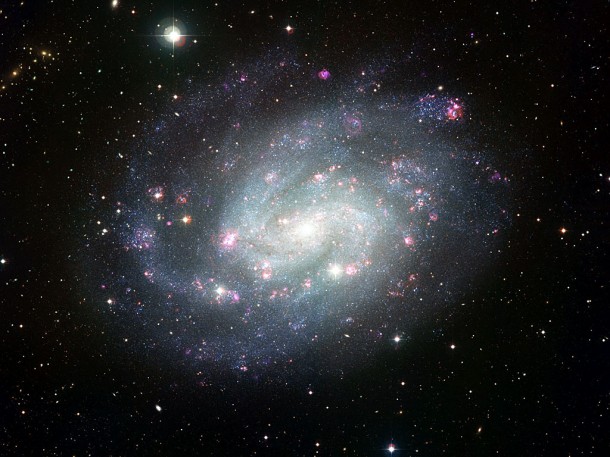 This picture of the spectacular southern spiral galaxy NGC 300 was taken using the Wide Field Imager (WFI) at ESO’s La Silla Observatory in Chile. Credit: ESO This picture of the spectacular southern spiral galaxy NGC 300 was taken using the Wide Field Imager (WFI) at ESO’s La Silla Observatory in Chile. Credit: ESO