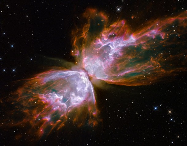 This celestial object looks like a delicate butterfly. But it is far from serene. Credit: NASA, ESA and the Hubble SM4 ERO Team This celestial object looks like a delicate butterfly. But it is far from serene. Credit: NASA, ESA and the Hubble SM4 ERO Team