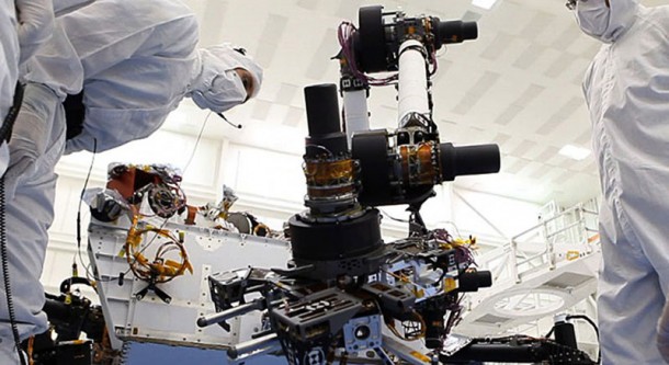 Spacecraft technicians at NASA's Jet Propulsion Laboratory, Pasadena, Calif., conduct a test of the robotic arm on Mars rover Curiosity. Image credit: NASA/JPL-Caltech Spacecraft technicians at NASA's Jet Propulsion Laboratory, Pasadena, Calif., conduct a test of the robotic arm on Mars rover Curiosity. Image credit: NASA/JPL-Caltech