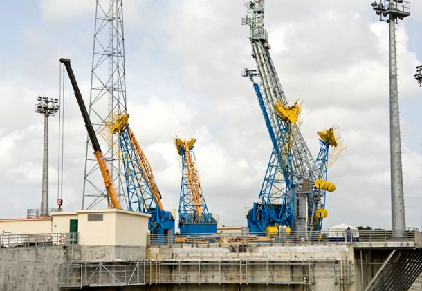 The four primary support arms that suspend Soyuz over its launch pad are shown in their opened position. During the launcher’s checkout and final countdown, these arms are closed around the Soyuz, forming a support ring at the vehicle’s “waist.”. Credit: Arianespace The four primary support arms that suspend Soyuz over its launch pad are shown in their opened position. During the launcher’s checkout and final countdown, these arms are closed around the Soyuz, forming a support ring at the vehicle’s “waist.”. Credit: Arianespace