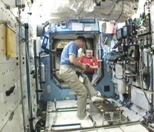 Commander Doug Wheelock (foreground) and Flight Engineer Fyodor Yurchikhin work together inside the Destiny laboratory. Credit: NASA TV Commander Doug Wheelock (foreground) and Flight Engineer Fyodor Yurchikhin work together inside the Destiny laboratory. Credit: NASA TV