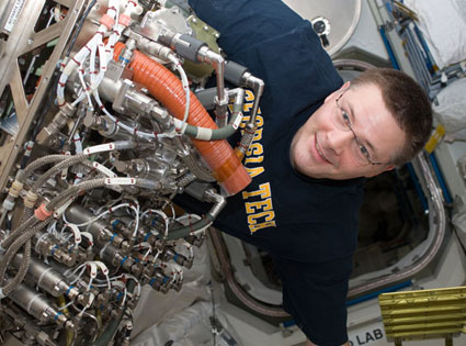 In the Tranquility node aboard the International Space Station, Commander Doug Wheelock works to install the new Sabatier. Credit: NASA In the Tranquility node aboard the International Space Station, Commander Doug Wheelock works to install the new Sabatier. Credit: NASA