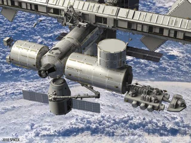 At the SpaceX booth at the USA Science & Engineering Festival, attendees will have the opportunity to have their pictures taken in front of a computer generated image of the Dragon spacecraft berthing with the International Space Station. At the SpaceX booth at the USA Science & Engineering Festival, attendees will have the opportunity to have their pictures taken in front of a computer generated image of the Dragon spacecraft berthing with the International Space Station.
