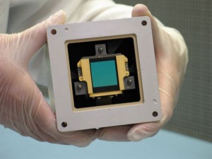 This model of the MIRI detector (in green) is similar to the charge-coupled devices in digital cameras. It's housed in the brick-like unit called a focal plane module. Credit: NASA This model of the MIRI detector (in green) is similar to the charge-coupled devices in digital cameras. It's housed in the brick-like unit called a focal plane module. Credit: NASA