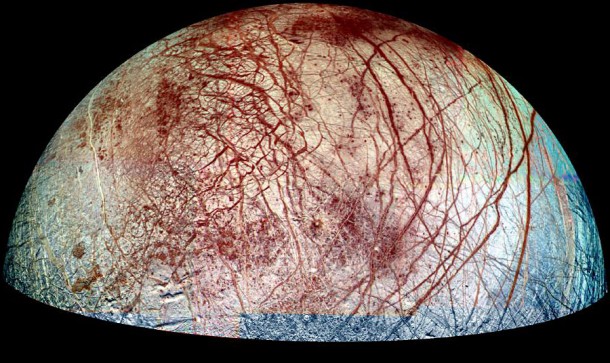The icy surface of Europa is shown strewn with cracks, ridges and "chaotic terrain," where the surface has been disrupted and ice blocks have moved around. New laboratory experiments show that water ice and frozen sulfur dioxide react even at the frigid temperatures of Europa. Because the reaction occurs without the aid of radiation, it could take place throughout the moon's thick ice layer—an outcome that would revamp current thinking about the chemistry and geology of this moon and perhaps others. Credit: NASA/JPL/University of Arizona The icy surface of Europa is shown strewn with cracks, ridges and "chaotic terrain," where the surface has been disrupted and ice blocks have moved around. New laboratory experiments show that water ice and frozen sulfur dioxide react even at the frigid temperatures of Europa. Because the reaction occurs without the aid of radiation, it could take place throughout the moon's thick ice layer—an outcome that would revamp current thinking about the chemistry and geology of this moon and perhaps others. Credit: NASA/JPL/University of Arizona