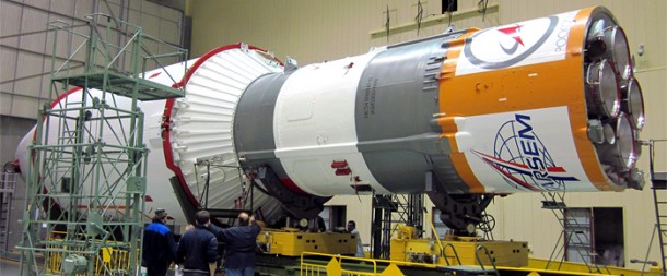 The Soyuz upper composite is shown mated to launcher’s third stage in the MIK 40 vehicle assembly building at Baikonur Cosmodrome. The Soyuz upper composite is shown mated to launcher’s third stage in the MIK 40 vehicle assembly building at Baikonur Cosmodrome.
