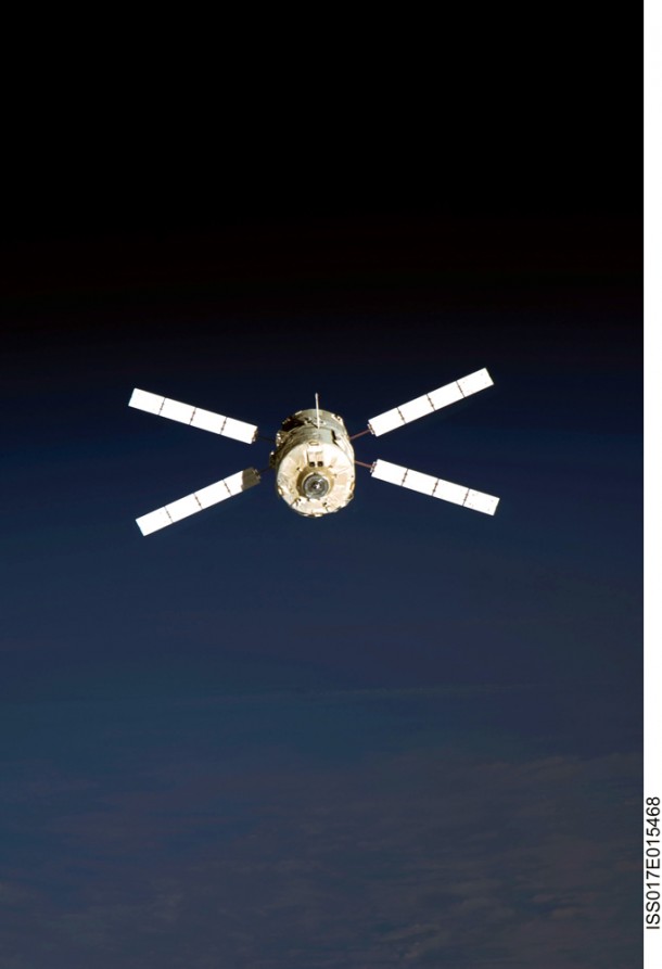 Backdropped by the blackness of space, ESA's Jules Verne Automated Transfer Vehicle (lower left) appears to be very small as it continues its relative separation from the International Space Station. Backdropped by the blackness of space, ESA's Jules Verne Automated Transfer Vehicle (lower left) appears to be very small as it continues its relative separation from the International Space Station.