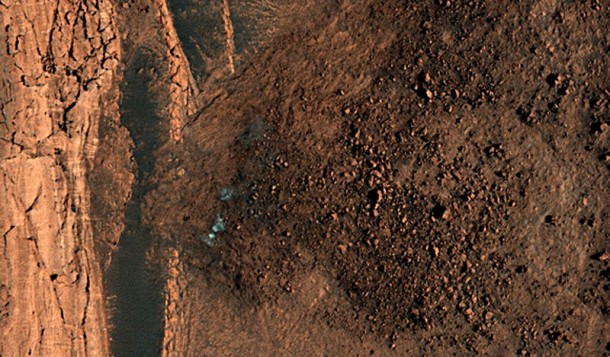 This landslide was spotted by Stu Atkinson; boulders and debris are below a steep north polar boundary scarp. Credit: NASA/JPL/University of Arizona This landslide was spotted by Stu Atkinson; boulders and debris are below a steep north polar boundary scarp. Credit: NASA/JPL/University of Arizona