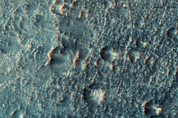 Syrtis Major Planum Channel and Depression. Credit: NASA/JPL/University of Arizona