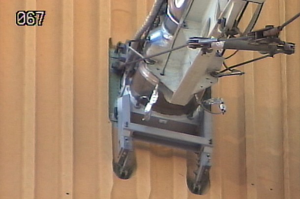 The Ground Umbilical Carrier Plate, or GUCP, on the launch pad Friday morning. Photo Credit: NASA TV The Ground Umbilical Carrier Plate, or GUCP, on the launch pad Friday morning. Photo Credit: NASA TV
