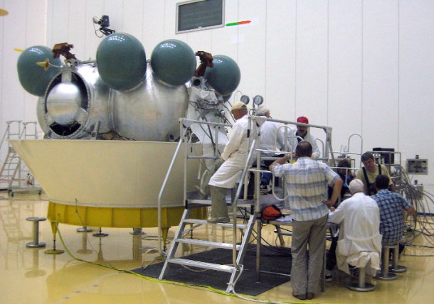 The full-scale functional model of Soyuz’ Fregat upper stage is monitored during fueling tests at the Spaceport’s S3B preparation building in June. Fregat uses UDMH, hydrazine and NTO storable propellants, and is designed to be restarted in flight. The full-scale functional model of Soyuz’ Fregat upper stage is monitored during fueling tests at the Spaceport’s S3B preparation building in June. Fregat uses UDMH, hydrazine and NTO storable propellants, and is designed to be restarted in flight.