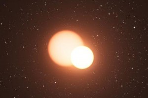 Caption: This artist's impression shows the double star OGLE-LMC-CEP0227 in our neighboring galaxy the Large Magellanic Cloud. The smaller of the two stars is a pulsating Cepheid variable and the orientation of the system is such that the stars eclipse each other during their orbits. Studies of this very rare system have allowed astronomers to measure the Cepheid mass with unprecedented accuracy. Credit: ESO/L. Calçada Caption: This artist's impression shows the double star OGLE-LMC-CEP0227 in our neighboring galaxy the Large Magellanic Cloud. The smaller of the two stars is a pulsating Cepheid variable and the orientation of the system is such that the stars eclipse each other during their orbits. Studies of this very rare system have allowed astronomers to measure the Cepheid mass with unprecedented accuracy. Credit: ESO/L. Calçada