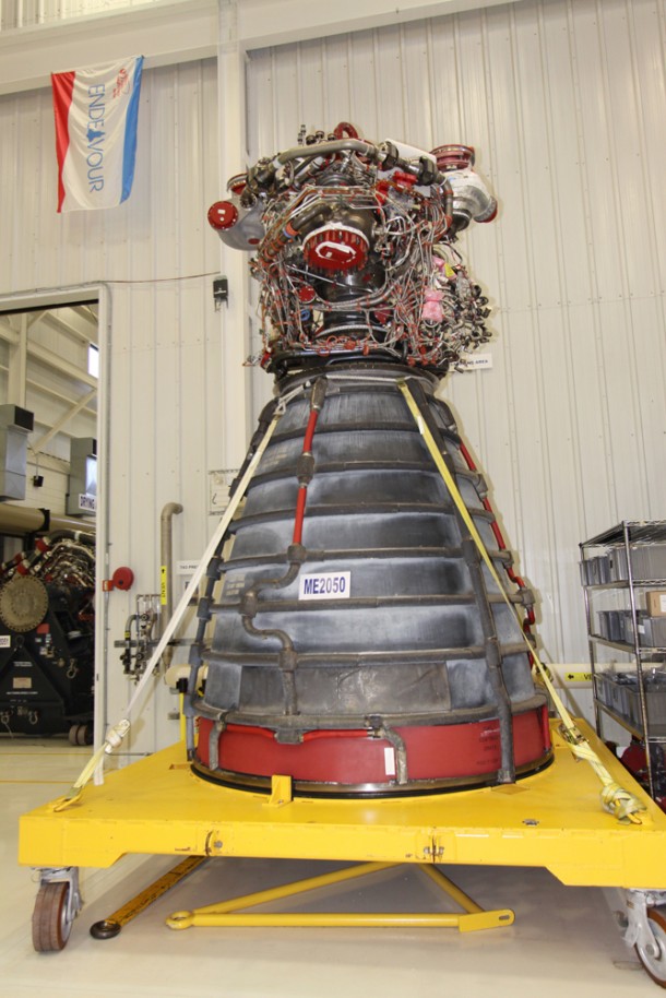 A space shuttle main engine stands alone. Technicians have rotating devices to position the engines for processing. Photo credit: NASA/Jack Pfaller A space shuttle main engine stands alone. Technicians have rotating devices to position the engines for processing. Photo credit: NASA/Jack Pfaller
