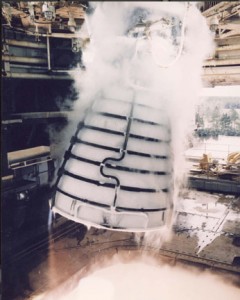 A space shuttle main engine undergoes a test firing inside a test stand at NASA's Stennis Space Center in Mississippi. Note that frost has formed on the outside of the engine nozzle even as 6,000 degree exhaust erupts from inside. Photo credit: NASA A space shuttle main engine undergoes a test firing inside a test stand at NASA's Stennis Space Center in Mississippi. Note that frost has formed on the outside of the engine nozzle even as 6,000 degree exhaust erupts from inside. Photo credit: NASA