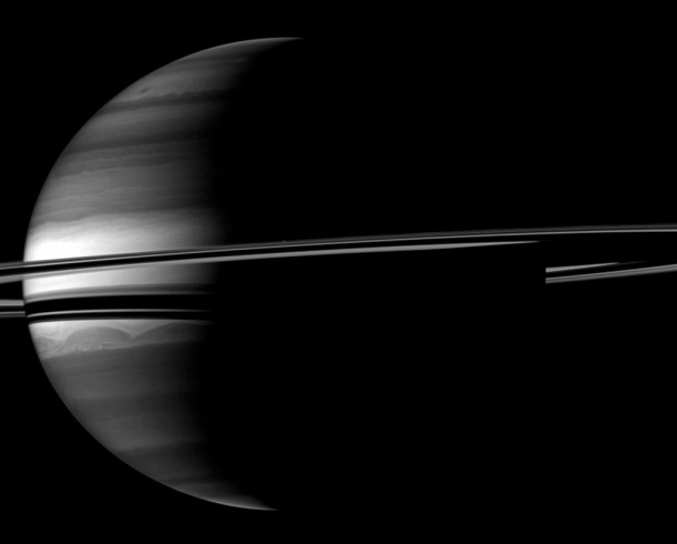 A crescent Saturn appears nestled within encircling rings. Credit: NASA/JPL/Space Science Institute A crescent Saturn appears nestled within encircling rings. Credit: NASA/JPL/Space Science Institute