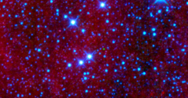 That green dot in the middle of this image might look like an emerald amidst glittering diamonds, but it is actually a dim star belonging to a class called brown dwarfs. This particular object is the first ultra-cool brown dwarf discovered by WISE. Image credit: NASA/JPL-Caltech/UCLA That green dot in the middle of this image might look like an emerald amidst glittering diamonds, but it is actually a dim star belonging to a class called brown dwarfs. This particular object is the first ultra-cool brown dwarf discovered by WISE. Image credit: NASA/JPL-Caltech/UCLA