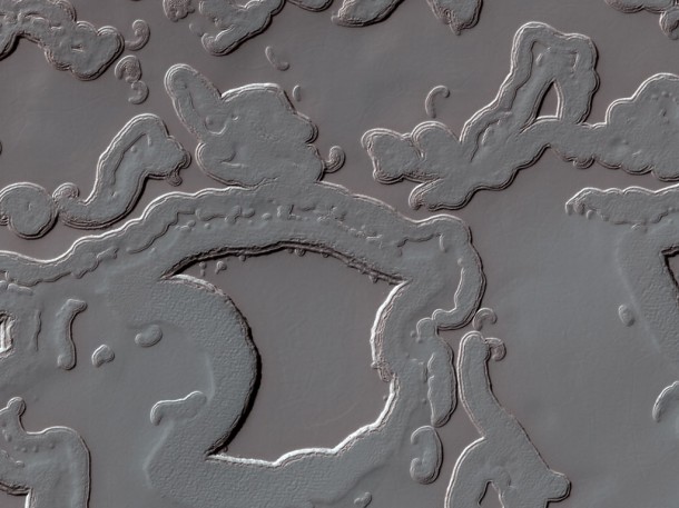Growing Pits in the Martian South Polar Ice Cap. Credit: NASA/JPL/University of Arizona