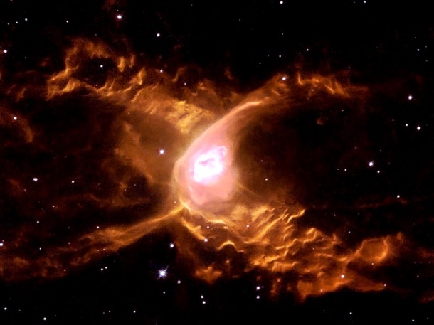 The Red Spider Nebula: Surfing in Sagittarius. Credit: ESA & Garrelt Mellema (Leiden University, the Netherlands) The Red Spider Nebula: Surfing in Sagittarius. Credit: ESA & Garrelt Mellema (Leiden University, the Netherlands)