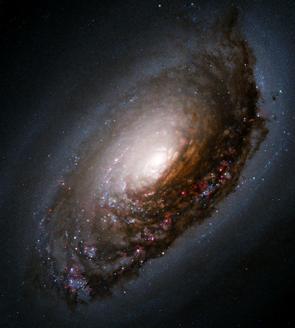 An Abrasive Collision Gives One Galaxy a "Black Eye. Credit: NASA/ESA and The Hubble Heritage Team (AURA/STScI) An Abrasive Collision Gives One Galaxy a "Black Eye. Credit: NASA/ESA and The Hubble Heritage Team (AURA/STScI)