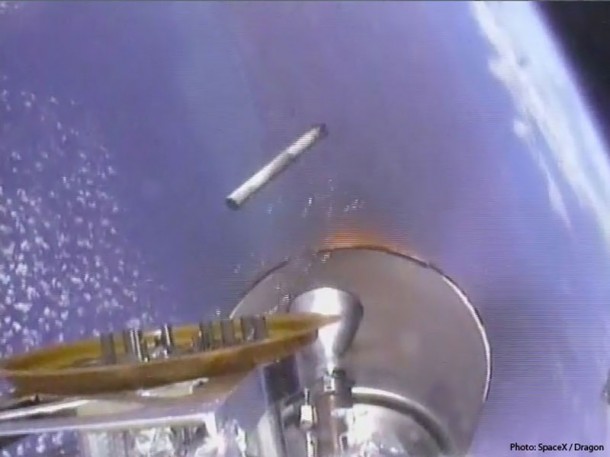After stage separation, flames are barely visible around nozzle as the second stage engine ignites and the first stage falls back to the Earth below. Credit: SpaceX After stage separation, flames are barely visible around nozzle as the second stage engine ignites and the first stage falls back to the Earth below. Credit: SpaceX