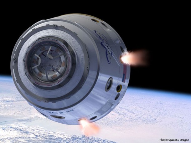 Illustration showing Draco thrusters firing as the Dragon spacecraft travels around the Earth. Dragon is equipped with numerous redundant systems to ensure mission success even if primary systems fail. Credit: SpaceX Illustration showing Draco thrusters firing as the Dragon spacecraft travels around the Earth. Dragon is equipped with numerous redundant systems to ensure mission success even if primary systems fail. Credit: SpaceX