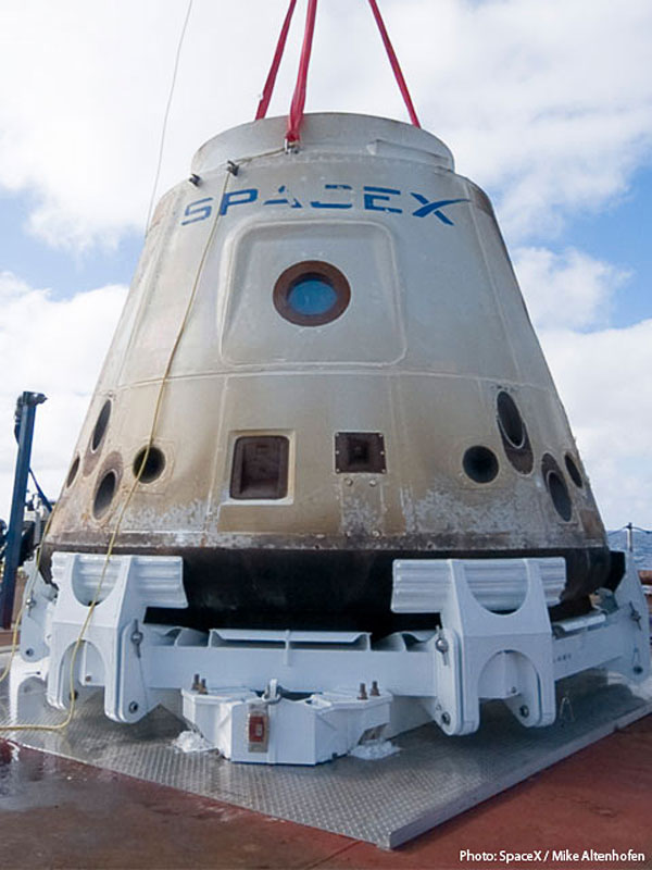 The Dragon spacecraft, in excellent condition after its 50,000 mile mission, rests in its cradle for the 500 mile ride back to Los Angeles. Credit: SpaceX The Dragon spacecraft, in excellent condition after its 50,000 mile mission, rests in its cradle for the 500 mile ride back to Los Angeles. Credit: SpaceX