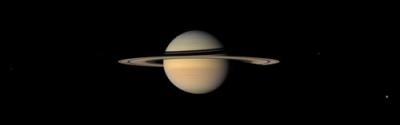 Saturn was photographed from near Iapetus by Cassini on Sept. 10, 2007, as the spacecraft prepared for its final approach to the moon. The spacecraft is about 3.3 million kilometers (2.1 million miles) from Saturn. As the image shows, Iapetus's orbit is tilted with respect to Saturn's. Since Saturn's other moons orbit in the same plane as the planet, they "see" Saturn's rings edge-on. Credit: NASA/JPL/SSI Saturn was photographed from near Iapetus by Cassini on Sept. 10, 2007, as the spacecraft prepared for its final approach to the moon. The spacecraft is about 3.3 million kilometers (2.1 million miles) from Saturn. As the image shows, Iapetus's orbit is tilted with respect to Saturn's. Since Saturn's other moons orbit in the same plane as the planet, they "see" Saturn's rings edge-on. Credit: NASA/JPL/SSI