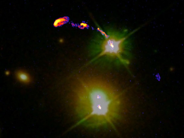 This is a wide-field composite e-MERLIN (radio) and HST (optical) image of the Double Quasar. Here the lensed quasar images are visible as the two bright objects, one above the other, separated by about 6 arcseconds. Credit: Jodrell Bank Centre for Astrophysics, University of Manchester This is a wide-field composite e-MERLIN (radio) and HST (optical) image of the Double Quasar. Here the lensed quasar images are visible as the two bright objects, one above the other, separated by about 6 arcseconds. Credit: Jodrell Bank Centre for Astrophysics, University of Manchester