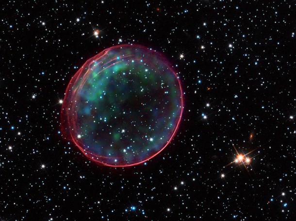 This colorful creation was made by combining data from two of NASA's Great Observatories. Optical data of SNR 0509-67.5 and its accompanying star field, taken with the Hubble Space Telescope, are composited with X-ray images from the Chandra X-ray Observatory. Credit: NASA, ESA, CXC, SAO, the Hubble Heritage Team (STScI/AURA), and J. Hughes (Rutgers University) This colorful creation was made by combining data from two of NASA's Great Observatories. Optical data of SNR 0509-67.5 and its accompanying star field, taken with the Hubble Space Telescope, are composited with X-ray images from the Chandra X-ray Observatory. Credit: NASA, ESA, CXC, SAO, the Hubble Heritage Team (STScI/AURA), and J. Hughes (Rutgers University)