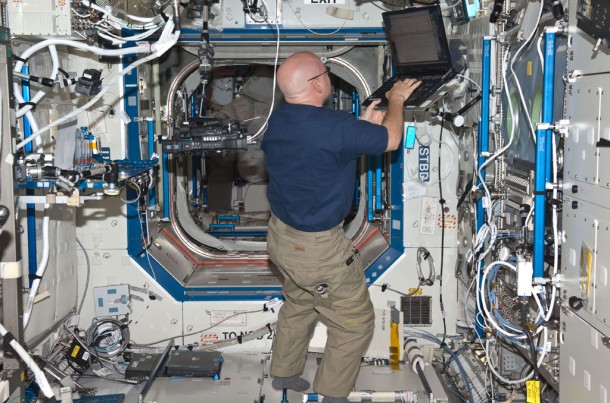 Expedition 26 Commander Scott Kelly works in the International Space Station’s U.S. Destiny laboratory. Credit: NASA TV Expedition 26 Commander Scott Kelly works in the International Space Station’s U.S. Destiny laboratory. Credit: NASA TV