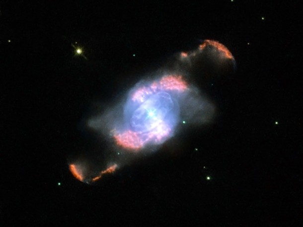 IC4634’s Glowing Waves. Credit: ESA/Hubble and NASA.