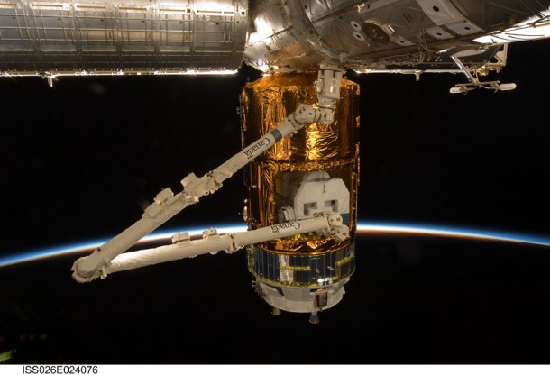 The Japanese Kounotori2 H-II Transfer Vehicle, docked to the Earth-facing port of the Harmony node and in the grapple of the Canadarm2, is featured in this image photographed by an Expedition 26 crew member on the International Space Station. Credit: NASA The Japanese Kounotori2 H-II Transfer Vehicle, docked to the Earth-facing port of the Harmony node and in the grapple of the Canadarm2, is featured in this image photographed by an Expedition 26 crew member on the International Space Station. Credit: NASA