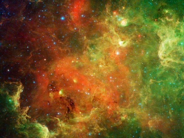 This swirling landscape of stars is known as the North American nebula. In visible light, the region resembles North America, but in this new infrared view from NASA's Spitzer Space Telescope, the continent disappears. Image credit: NASA/JPL-Caltech This swirling landscape of stars is known as the North American nebula. In visible light, the region resembles North America, but in this new infrared view from NASA's Spitzer Space Telescope, the continent disappears. Image credit: NASA/JPL-Caltech