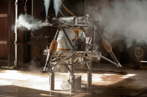 The robotic lander during strapdown testing. This phase of tests allows the engineering team to fully check out the integrated lander prototype before moving to more complex free flight tests. (NASA/MSFC/David Higginbotham) The robotic lander during strapdown testing. This phase of tests allows the engineering team to fully check out the integrated lander prototype before moving to more complex free flight tests. (NASA/MSFC/David Higginbotham)