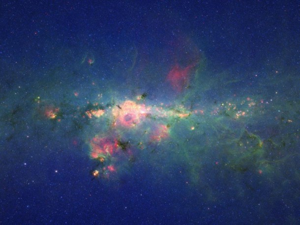 A view from the bustling center of our galactic metropolis. Spitzer Space Telescope offers us a fresh, infrared view of the frenzied scene at the center of our Milky Way, revealing what lies behind the dust. Image credit: NASA/JPL-Caltech A view from the bustling center of our galactic metropolis. Spitzer Space Telescope offers us a fresh, infrared view of the frenzied scene at the center of our Milky Way, revealing what lies behind the dust. Image credit: NASA/JPL-Caltech