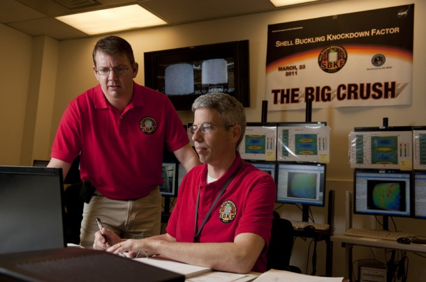 Mark Hilburger, senior research engineer in the Structural Mechanics and Concepts Branch at Langley and the principal investigator of the NESC's Shell Buckling Knockdown Factor project and Mike Roberts, an engineer in Marshall's structural strength test branch and the center lead for this activity review real-time data from the March 23, 2011 "can crush" test. (NASA/MSFC/D. Higginbotham) Mark Hilburger, senior research engineer in the Structural Mechanics and Concepts Branch at Langley and the principal investigator of the NESC's Shell Buckling Knockdown Factor project and Mike Roberts, an engineer in Marshall's structural strength test branch and the center lead for this activity review real-time data from the March 23, 2011 "can crush" test. (NASA/MSFC/D. Higginbotham)
