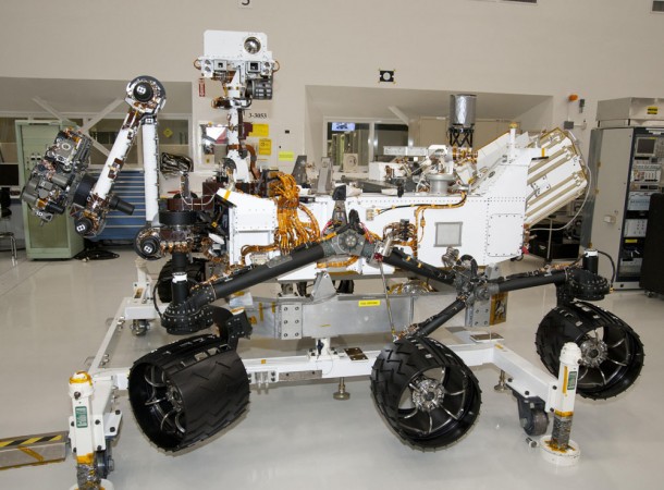 NASA Mars Rover Curiosity at JPL, Side View The rover for NASA's Mars Science Laboratory mission, named Curiosity, is about 3 meters (10 feet) long, not counting the additional length that the rover's arm can be extended forward. The front of the rover is on the left in this side view. Image credit: NASA/JPL-Caltech NASA Mars Rover Curiosity at JPL, Side View The rover for NASA's Mars Science Laboratory mission, named Curiosity, is about 3 meters (10 feet) long, not counting the additional length that the rover's arm can be extended forward. The front of the rover is on the left in this side view. Image credit: NASA/JPL-Caltech