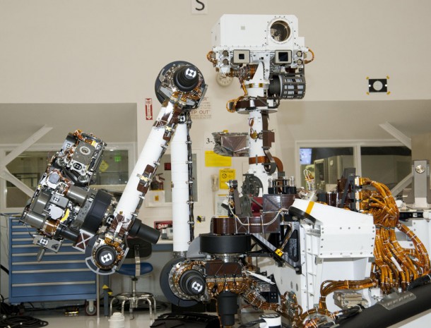 Arm and Mast of NASA Mars Rover Curiosity Curiosity's arm and remote sensing mast carry science instruments and other tools for the mission. This image, taken April 4, 2011, inside the Spacecraft Assembly Facility at JPL shows the arm on the left and the mast just right of center. Image credit: NASA/JPL-Caltech Arm and Mast of NASA Mars Rover Curiosity Curiosity's arm and remote sensing mast carry science instruments and other tools for the mission. This image, taken April 4, 2011, inside the Spacecraft Assembly Facility at JPL shows the arm on the left and the mast just right of center. Image credit: NASA/JPL-Caltech