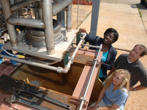Engineers, from left, Lakiesha V. Hawkins, David C. Reynolds, and Cynthia L. Sprader inspect the J-2X fuel turbopump first stage nozzle after a successful test series in Marshall's Test Stand 116. (NASA/MSFC/D. Olive) Engineers, from left, Lakiesha V. Hawkins, David C. Reynolds, and Cynthia L. Sprader inspect the J-2X fuel turbopump first stage nozzle after a successful test series in Marshall's Test Stand 116. (NASA/MSFC/D. Olive)