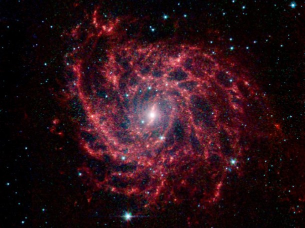 IC 342's dust structures show up vividly in red, in this infrared view from Spitzer. Image credit: NASA/JPL-Caltech IC 342's dust structures show up vividly in red, in this infrared view from Spitzer. Image credit: NASA/JPL-Caltech