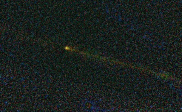 Comet Hartley 2 as seen by WISE. Data from the infrared telescope revealed that the comet's trail, seen here as the long, thin yellow line, consists of particles as large as golf balls. Image credit: NASA/JPL-Caltech/UCLA Comet Hartley 2 as seen by WISE. Data from the infrared telescope revealed that the comet's trail, seen here as the long, thin yellow line, consists of particles as large as golf balls. Image credit: NASA/JPL-Caltech/UCLA