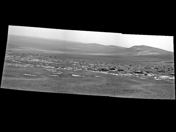 NASA's Mars Exploration Rover Opportunity used its panoramic camera (Pancam) to capture this view of a portion of Endeavour crater's rim after a drive during the rover's 2,676th Martian day, or sol, of working on Mars (Aug. 4, 2011). Image Credit: NASA/JPL-Caltech/Cornell/ASU NASA's Mars Exploration Rover Opportunity used its panoramic camera (Pancam) to capture this view of a portion of Endeavour crater's rim after a drive during the rover's 2,676th Martian day, or sol, of working on Mars (Aug. 4, 2011). Image Credit: NASA/JPL-Caltech/Cornell/ASU