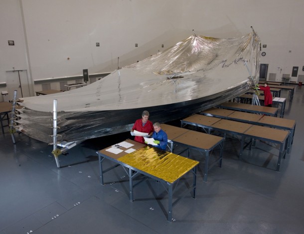 The five-layer James Webb Space Telescope sunshield consists of thin membranes made from a polymer-based film and supporting equipment such as spreader bars, booms, cabling, and containment shells. Designed to block solar light and keep the Observatory operating at cryogenic temperatures. Credit: NASA/Northrop Grumman The five-layer James Webb Space Telescope sunshield consists of thin membranes made from a polymer-based film and supporting equipment such as spreader bars, booms, cabling, and containment shells. Designed to block solar light and keep the Observatory operating at cryogenic temperatures. Credit: NASA/Northrop Grumman