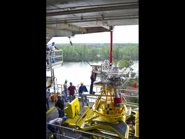 Stennis Space Center engineers in southern Mississippi lower the J-2X powerpack assembly in at A-1 test stand. (NASA/SSC) Stennis Space Center engineers in southern Mississippi lower the J-2X powerpack assembly in at A-1 test stand. (NASA/SSC)