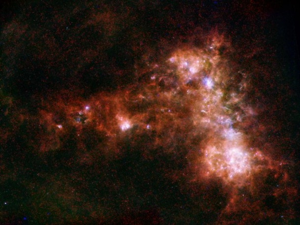 This new image shows the Small Magellanic Cloud galaxy in infrared light from the Herschel Space Observatory a European Space Agency-led mission with important NASA contributions, and NASA's Spitzer Space Telescope. Image credit: ESA/NASA/JPL-Caltech/STScI This new image shows the Small Magellanic Cloud galaxy in infrared light from the Herschel Space Observatory a European Space Agency-led mission with important NASA contributions, and NASA's Spitzer Space Telescope. Image credit: ESA/NASA/JPL-Caltech/STScI