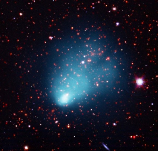 Composite image of the El Gordo galaxy cluster. (X-ray: NASA/CXC/Rutgers/J. Hughes et al; Optical: ESO/VLT & SOAR/Rutgers/F. Menanteau; IR: NASA/JPL/Rutgers/F. Menanteau ) Composite image of the El Gordo galaxy cluster. (X-ray: NASA/CXC/Rutgers/J. Hughes et al; Optical: ESO/VLT & SOAR/Rutgers/F. Menanteau; IR: NASA/JPL/Rutgers/F. Menanteau )