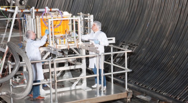 Summer 2011, Glenn Research Center engineers and technicians (left to right, clockwise): Joe Kerka, Tom Hudach, Andrew Sexton, and Allan Rybar transport NASA's Space Communications and Navigation (SCAN) Testbed flight system in the West High Bay area of the Power Systems Facility at Glenn Research Center in Cleveland on a dolly cart. Image credit: NASA Summer 2011, Glenn Research Center engineers and technicians (left to right, clockwise): Joe Kerka, Tom Hudach, Andrew Sexton, and Allan Rybar transport NASA's Space Communications and Navigation (SCAN) Testbed flight system in the West High Bay area of the Power Systems Facility at Glenn Research Center in Cleveland on a dolly cart. Image credit: NASA