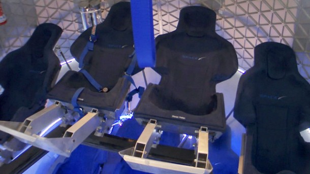 With all seven crewmembers in their seats, Dragon has sufficient interior space for three additional people to stand and assist the crew with their launch preparations. With all seven crewmembers in their seats, Dragon has sufficient interior space for three additional people to stand and assist the crew with their launch preparations.