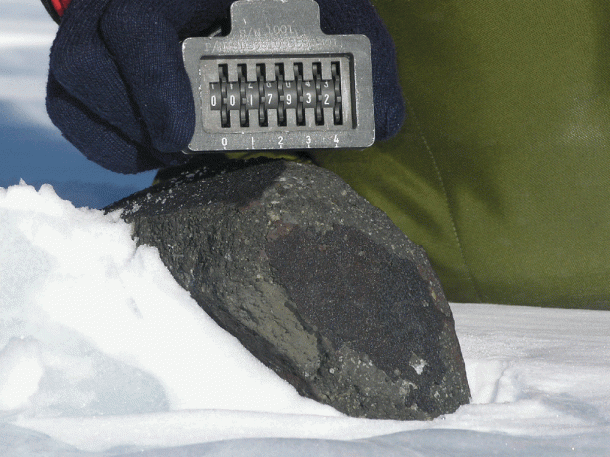 A meteorite analyzed in the study at its collection site in Antarctica. Credit: Antarctic Search for Meteorites program, Case Western Reserve University A meteorite analyzed in the study at its collection site in Antarctica. Credit: Antarctic Search for Meteorites program, Case Western Reserve University